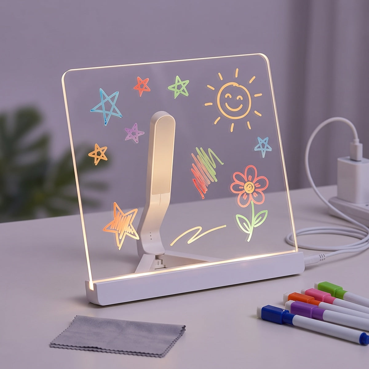 Clear drawing panel with white LED bar, folding easel, pens and USB cable